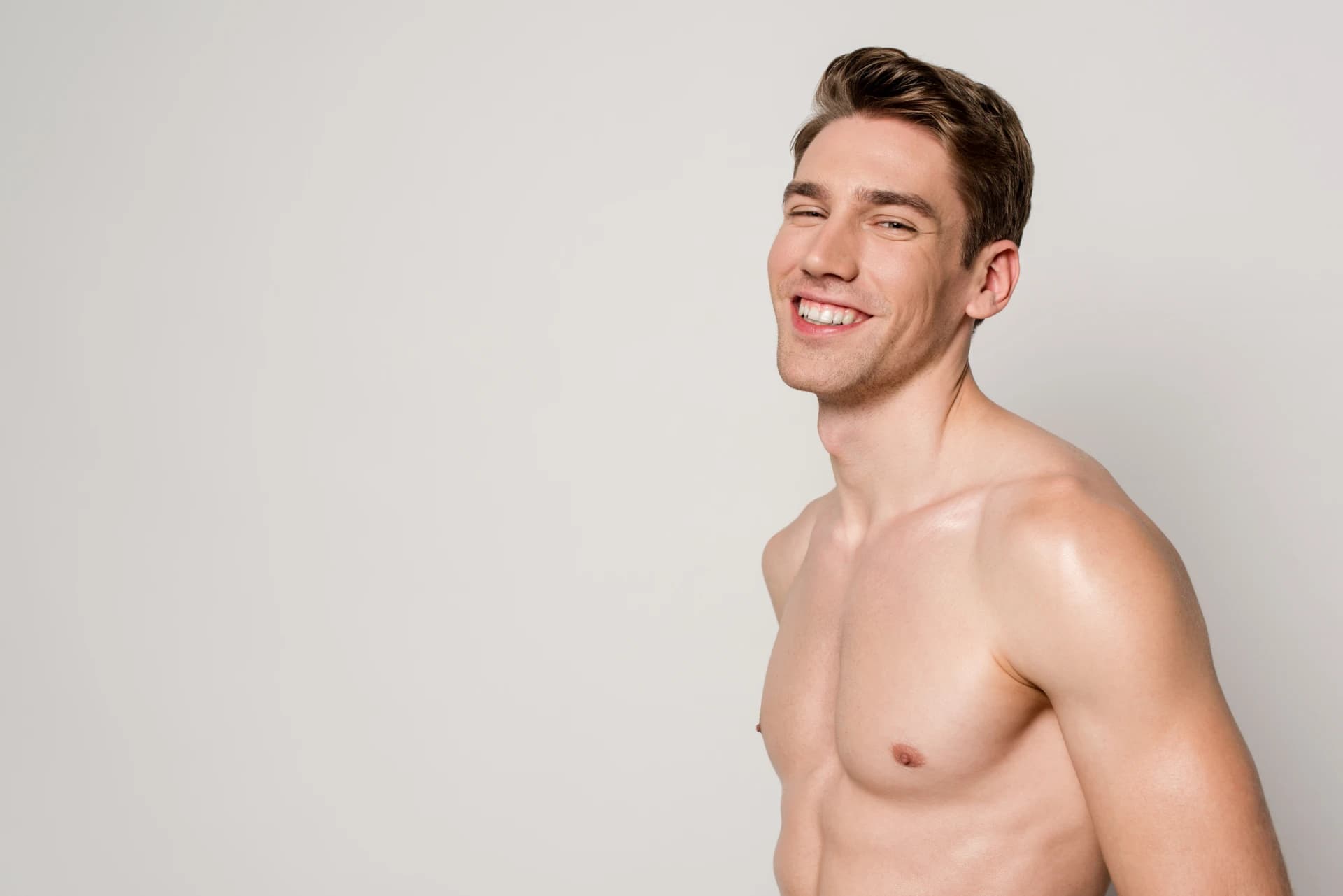 Laser hair removal men Cologne — relaxed smiling man after treatment at AD Beauty Studio